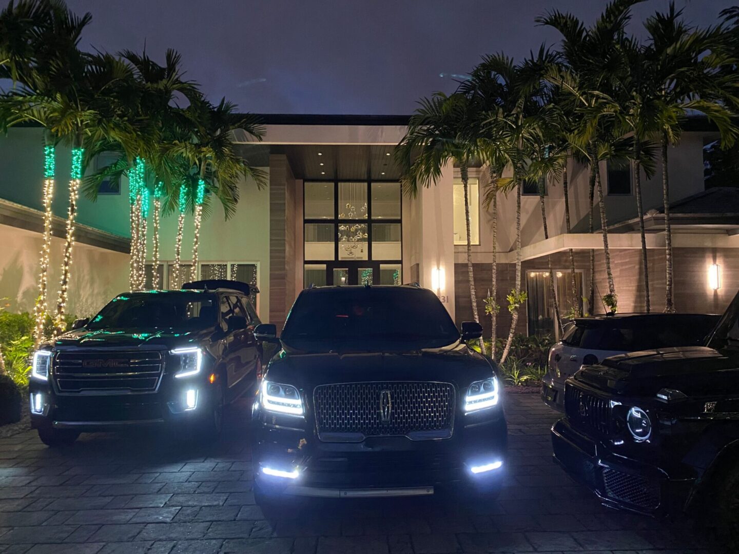 A bunch of cars parked in front of some buildings