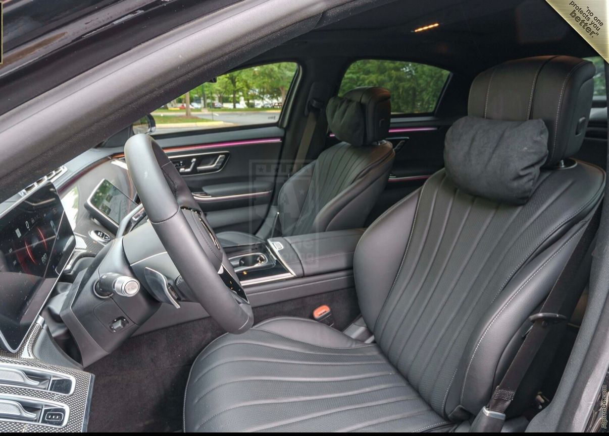 A car with grey seats and black trim