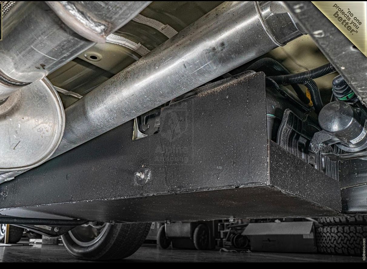 A close up of the underside of an automobile.