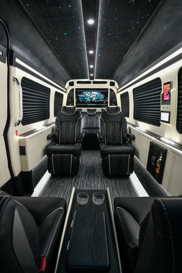 A black and white van with leather seats