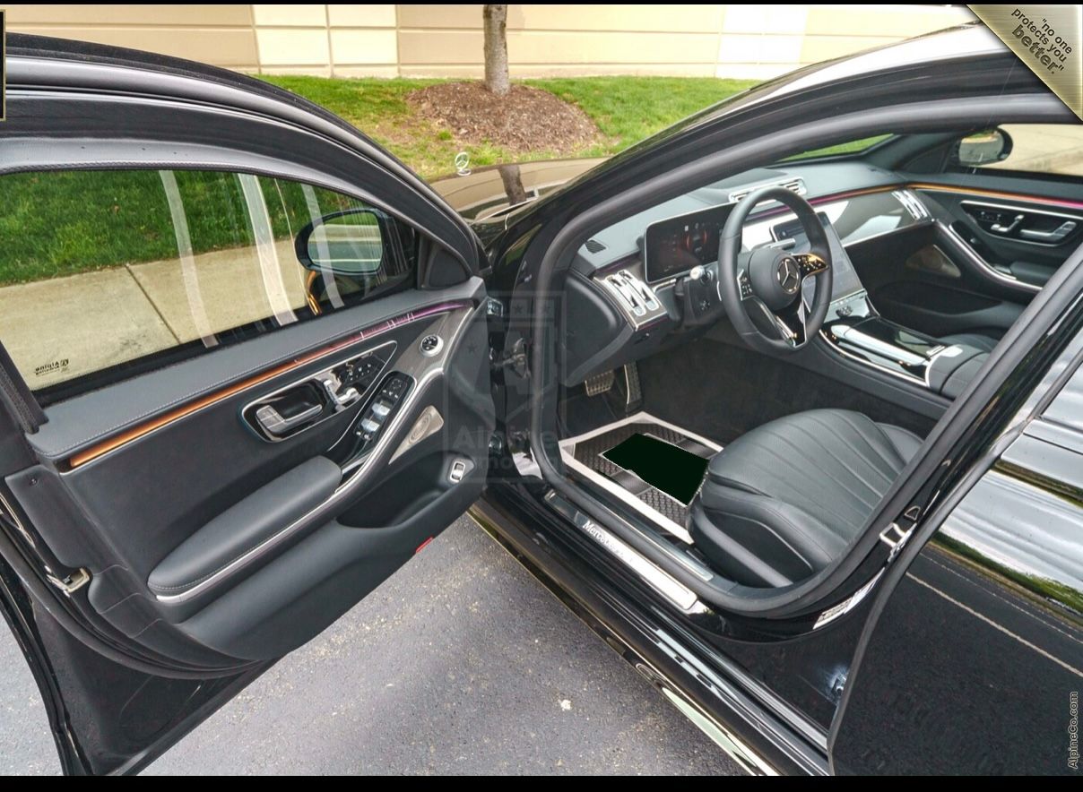 A car with the door open and its interior